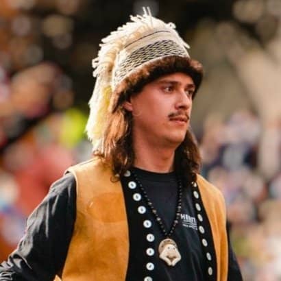 A man in regalia.