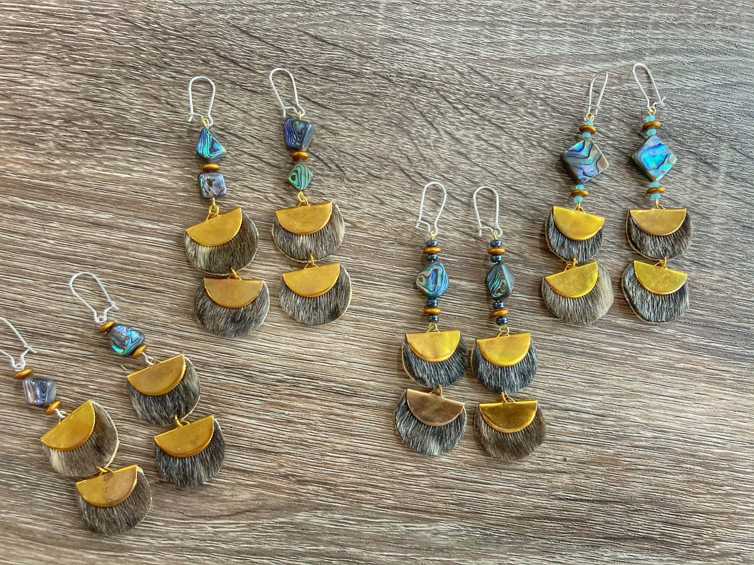 Three pairs of earrings.